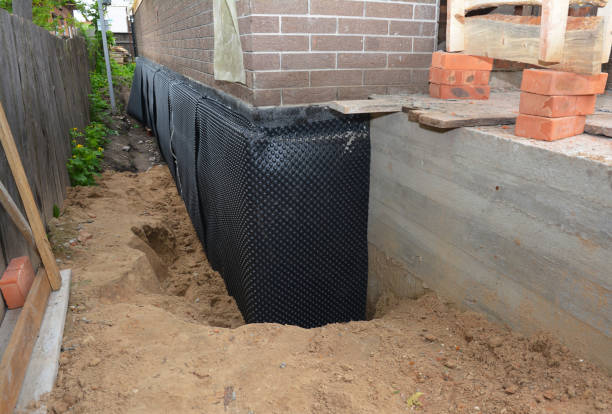 Happy homeowners after waterproofing job in Somerset